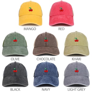 May include: A set of ten baseball caps with a cherry embroidered on the front. The caps are available in a variety of colors, including mango, red, olive, chocolate, khaki, black, navy, and light grey.