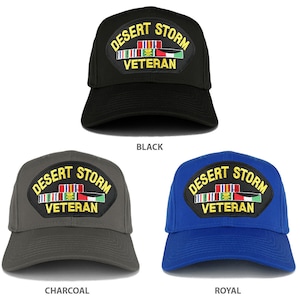 May include: Three baseball caps with a Desert Storm Veteran patch. The caps are black, charcoal gray, and royal blue.