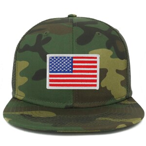 May include: A camouflage trucker hat with a white, red, and blue American flag patch on the front.
