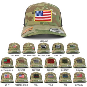 May include: A collection of 15 trucker hats with different colored American flag patches. The hats are all camouflage with a black mesh back. The patches include red, white, blue, green, black, and yellow.