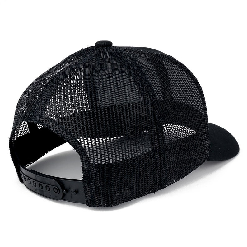 May include: Black mesh trucker hat with a black brim and a black adjustable strap. The hat has a mesh back and a solid front.