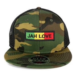 May include: A camouflage trucker hat with a black mesh back. The hat has a red, yellow, and green patch with the text "JAH LOVE" on it.