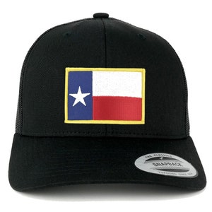 May include: Black trucker cap with a Texas state flag patch. The patch features a blue field with a white star, a white stripe, and a red stripe, with a gold border. The cap has a curved peak and a mesh back.