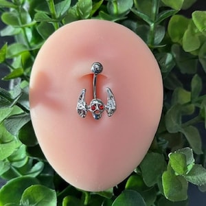 Skull Angel Wing Belly Ring: Red Gem Eyes, Surgical Steel 14G