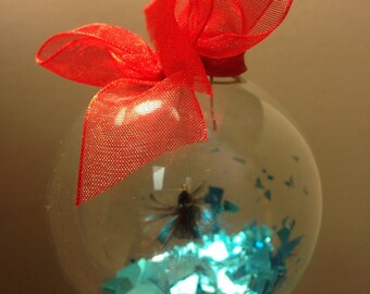 Hand Tied Fly Fishing Fly Glass Christmas Ornament - Squirrel Wing Streamer (Red/ Black) w/ Red Ribbon 2.5 inch diameter ornament