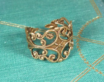Ring NIBELUNGEN aus bronzefarbenem Messing, verstellbar im keltischen Stil (257)