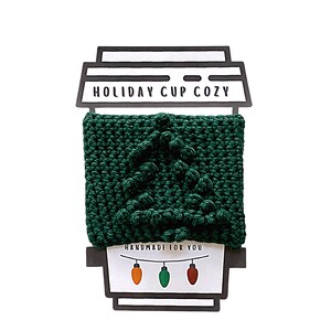 Crochet pattern details on a coffee cup cozy with a Christmas Tree on it by Hooked by Angel – includes step-by-step instructions, photos, and Angel’s Tips for easy crocheting, instant digital PDF download on Etsy. The pattern included a printable coffee cup template to display your cozy with the text HOLIDAY CUP COZY.