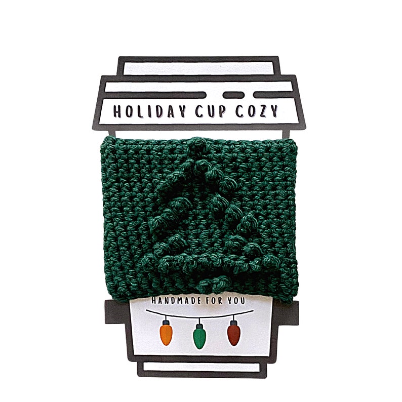 Crochet pattern details on a coffee cup cozy with a Christmas Tree on it by Hooked by Angel – includes step-by-step instructions, photos, and Angel’s Tips for easy crocheting, instant digital PDF download on Etsy. The pattern included a printable coffee cup template to display your cozy with the text HOLIDAY CUP COZY.