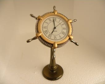vintage solid brass ships wheel clock by van cort inst.north hampton massachusetts