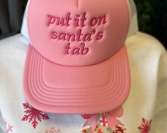Put it on Santa’s tab Trucker Hat