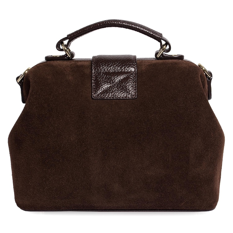 May include: A brown suede doctor bag with a leather handle and a brown leather flap closure.