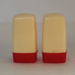 Vintage Plastic Red and Cream Salt and Pepper Shakers