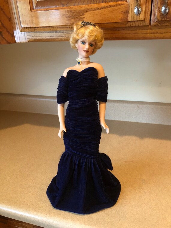 princess diana porcelain doll in blue dress Amazon.com: Princess Diana, Porcelain 15 Inches Doll in Navy Gown with Stuffed Body Made in Taiwan : Home & Kitchen