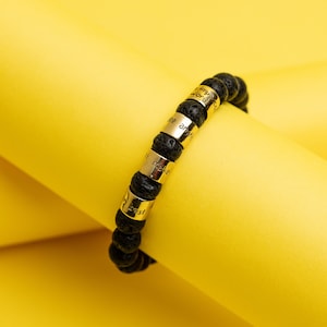 The Four Agreements Beaded Bracelet with Black Lava Rock and Brass Beads