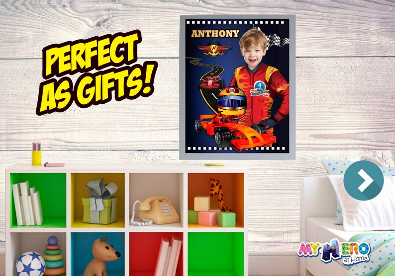 May include: Personalized racing poster featuring a child in a red racing suit, holding a helmet, with a red race car and a blue background. The poster has the name "ANTHONY" at the top and the text "My Hero at Home" at the bottom.