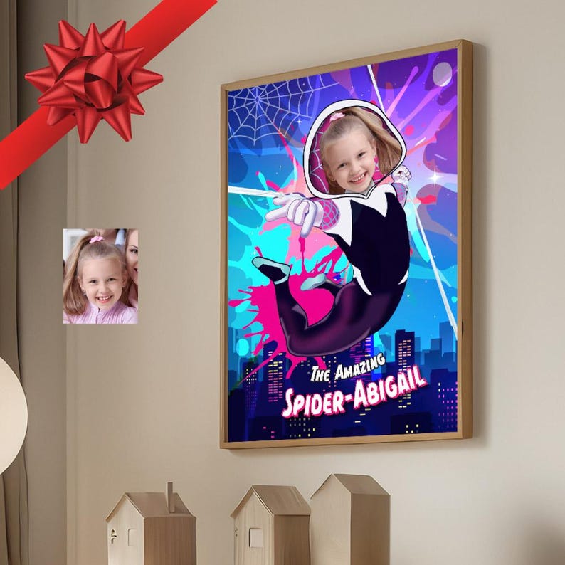 May include: A framed portrait featuring a young girl in a Spider-Gwen costume, with the text "THE AMAZING SPIDER-ABIGAIL." The artwork has a vibrant color scheme with pink, purple, and blue hues. A red bow and a small photo are also visible.