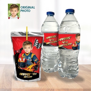 May include: A juice pouch and two water bottles with custom labels for a 4th birthday. The labels feature a child in a racing suit, race cars, and a checkered flag. The juice pouch has a yellow straw.