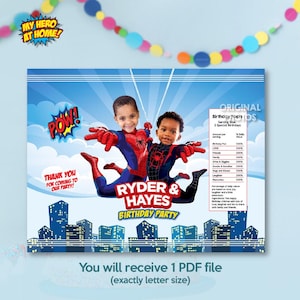 May include: A personalized birthday party invitation featuring two children dressed as Spider-Man characters. The design includes cityscape silhouettes, comic book sound effects, and the text "Ryder & Hayes Birthday Party."