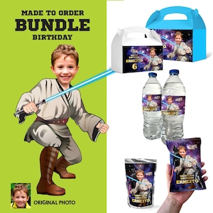 May include: A birthday party bundle featuring a custom illustration of a child dressed as a space warrior with a blue light sword. The set includes a white gable box, a blue gable box, two water bottles, and two snack pouches, all with space-themed graphics and the text Happy Birthday Ernesto 6.
