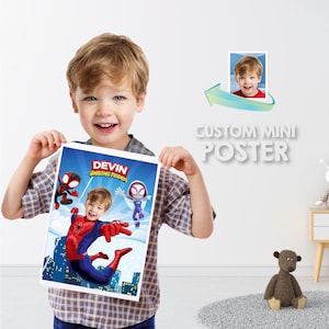 May include: A personalized mini poster featuring a child's photo with Spider-Man and Spider-Gwen characters. The poster has a blue background with white clouds and a cityscape. The text "DEVIN AMAZING FRIENDS" is printed on the poster.