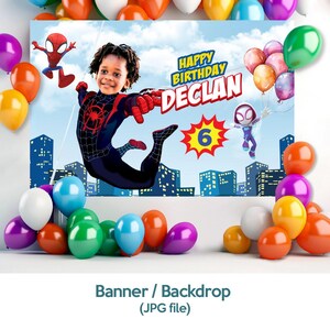 May include: A birthday banner featuring a child in a Spider-Man costume, with the text "Happy Birthday Declan" and the number "6". The backdrop includes city silhouettes, Spider-Man characters, and colorful balloons in the foreground.