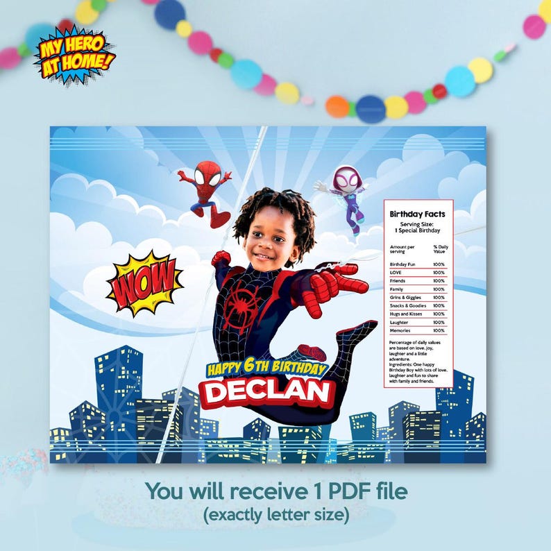 May include: A personalized birthday poster featuring a child in a Spider-Man costume against a city skyline. The text reads MY HERO AT HOME, WOW, HAPPY 6TH BIRTHDAY DECLAN, and a Birthday Facts nutrition label listing love, friends, and family.