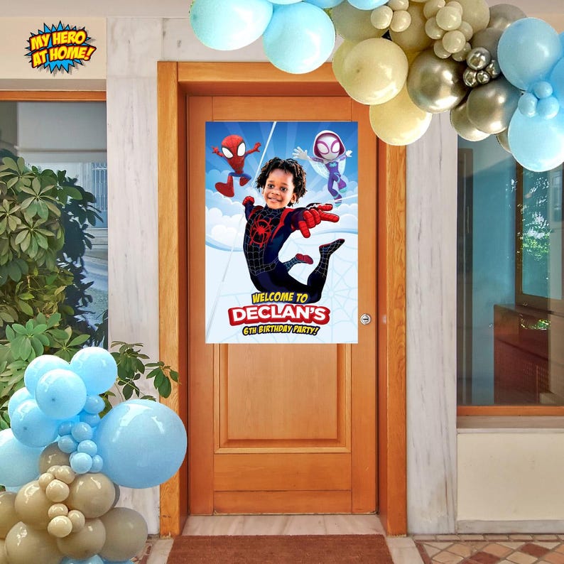 May include: A party banner featuring a child dressed as Spider-Man, with the text "WELCOME TO DECLAN'S 6TH BIRTHDAY PARTY!" in yellow and white. The banner is hanging on a wooden door, with balloons in the background.