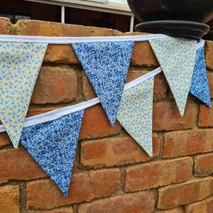 Vintage inspired floral blue lemon yellow double sided fabric bunting 3m with white trim