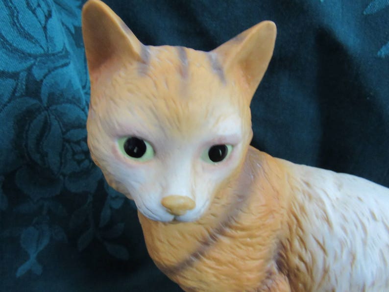 orange tabby cat statue
