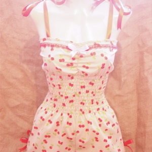 Cute,pale yellow cherry print playsuit with red bows lace & cherry! Rockabilly,1940's,1950's,pin-up,vintage,festivals,beachwear,retro!