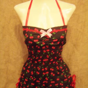 Cute,black cherry print halterneck playsuit with red bows lace & cherry! Rockabilly,1940's,1950's,pin-up,vintage,festivals,beachwear,retro!