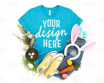 MOCKUP - Bella Canvas Heather Aqua Blue 3001 T-Shirt Flat Lay Easter Mockup Jeans, Pastel Shoes, Eggs, Bunny Ears on White Background JPEG