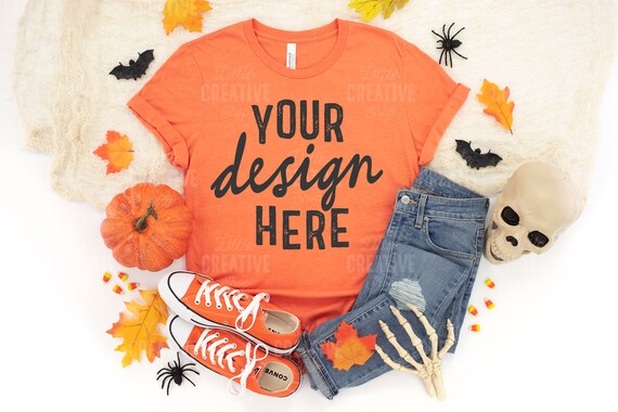 MOCKUP Heather Orange Bella Canvas 3001 T Shirt Flat Lay Halloween Skull Fall Leaves Spiders Skeleton Spooky Jeans Orange Shoes JPEG File