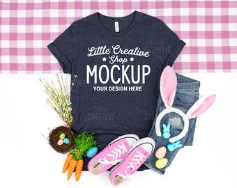MOCKUP - Bella Canvas 3001 Heather Navy T-Shirt Flat Lay Easter Mockup Jeans, Pastel Pink Shoes, Carrots, Bunny Ears, Eggs JPEG