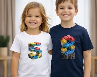 Personalisiertes Kinder Geburtstag T Shirt mit Name und Zahl Baustein Motiv Geschenk fuer Jungen und Maedchen zum Kindergeburtstag