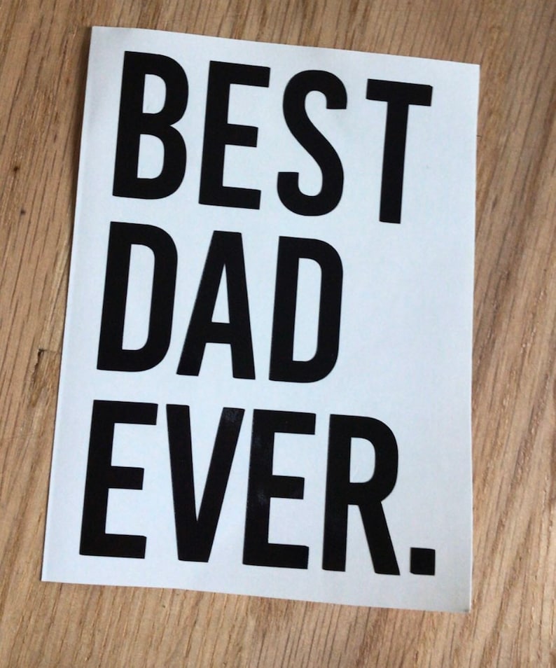 May include: White card with black text that reads "BEST DAD EVER."
