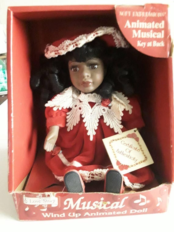 animated wind up musical doll