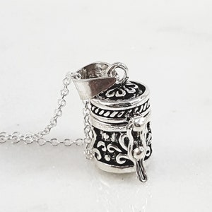 Prayer box necklace. beautiful solid sterling silver filigree cylinder pendant. silver medication. wish box. pill box. perfume pendant.