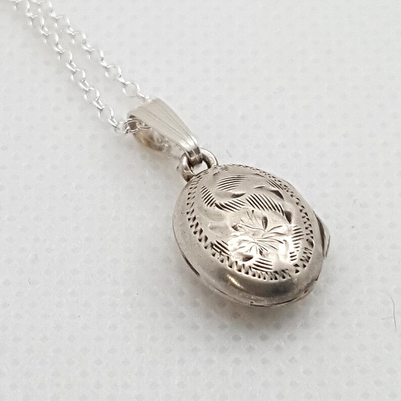 Antique sterling silver locket. hallmarked oval engraved locket. small photo locket. gifts for her. mother's day gift. heirloom jewelry image 1