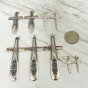 May include: A rustic wooden sign with the text "Welcome to our home" in white lettering. The sign features a distressed finish and a simple, inviting design, perfect for front door decor.