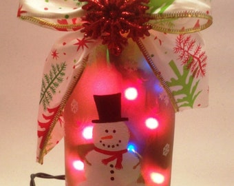 Snowman wine bottle lamp with colored lights