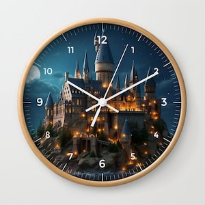 May include: A round clock with a wooden frame and a dark blue face. The clock face features a white castle with a clock tower and a white clock hand. The clock face also has white numbers and a white moon.