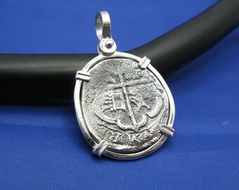 Sterling Silver Shipwreck Replica Coin with Unique Anchor Shaped Markings in Sterling Silver Pendant Bezel