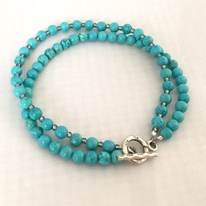 Double strand turquoise bracelet with artisan sterling silver toggle clasp