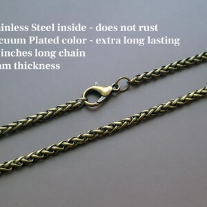 May include: A gold-toned chain necklace with a lobster clasp. The chain is 22 inches long and 3mm thick. It is made of stainless steel and has a vacuum-plated color for long-lasting wear.