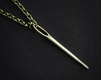 Nålformat halsband för någon som älskar att sy