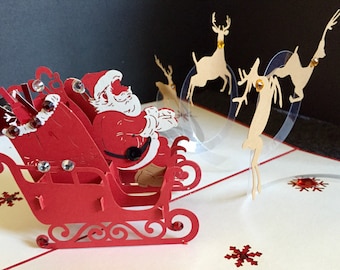 Merry Christmas/Seasons Greetings/Happy Holidays/3D Pop Up Christmas Santa on Sleigh & Reindeer Handmade Card