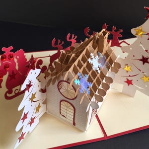 Vrolijk kerstfeest/seizoensgroeten/fijne feestdagen/3D pop-up kerstman slee op dak handgemaakte kaart