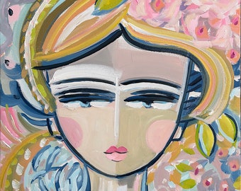 May include: A colorful abstract painting of a woman's face with a floral crown. The woman has blue eyes, a pink mouth, and a white forehead. The background is a mix of blue, pink, and green.