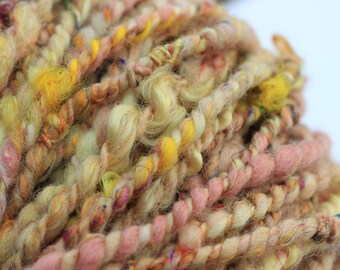 Handspun plant dyed soft shetland / merino / recycled sari silk, lots of yellows with rainbow apx 21yds / 50g